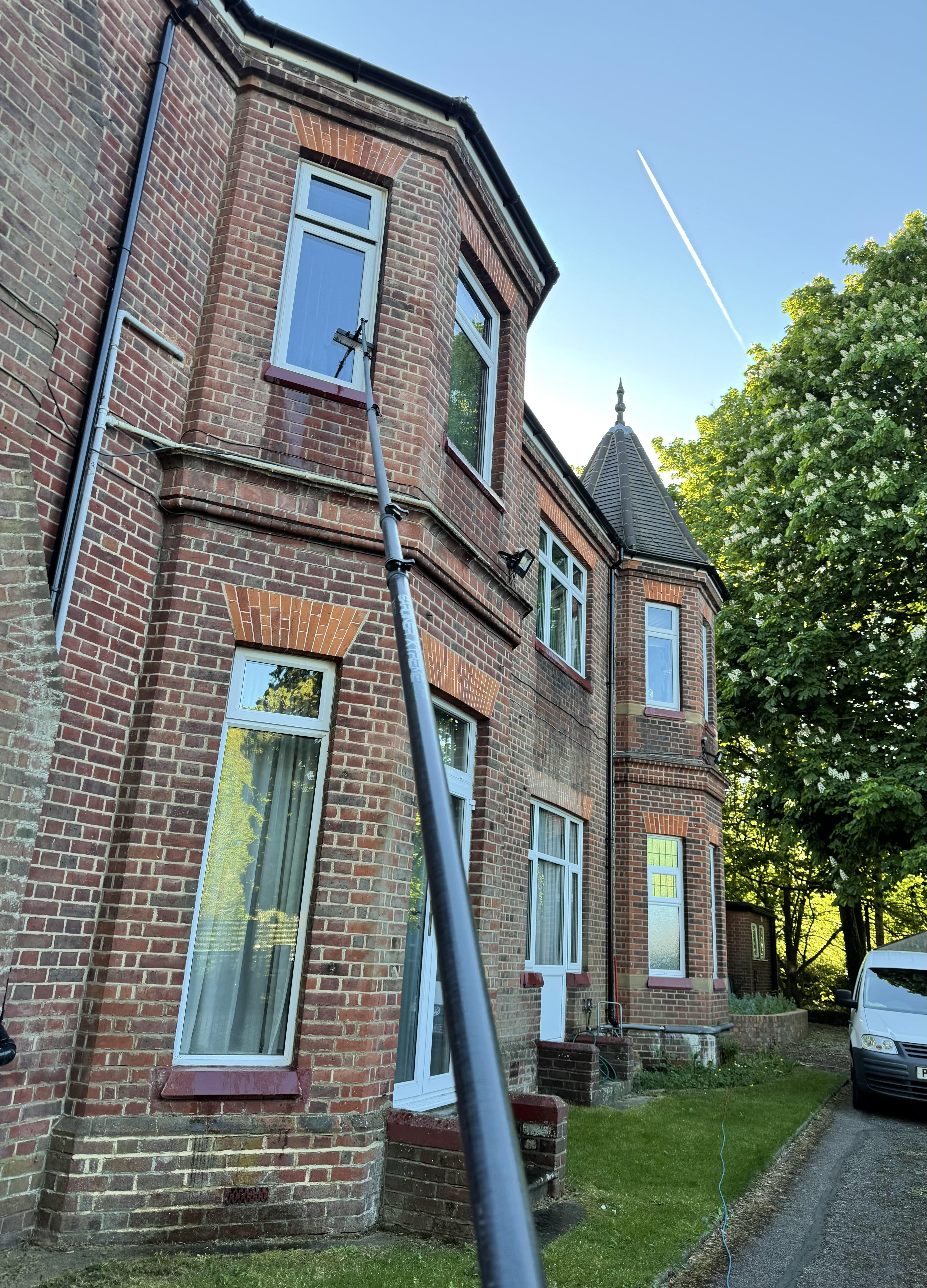 Window cleaning in St Albans using pure water reach and wash pole system